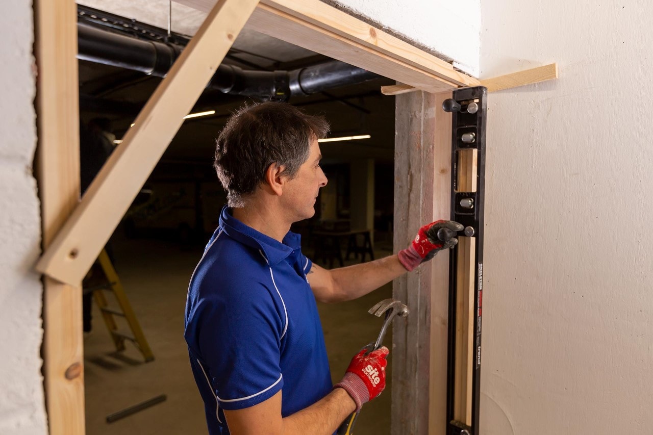 Fitting new door frame and doors