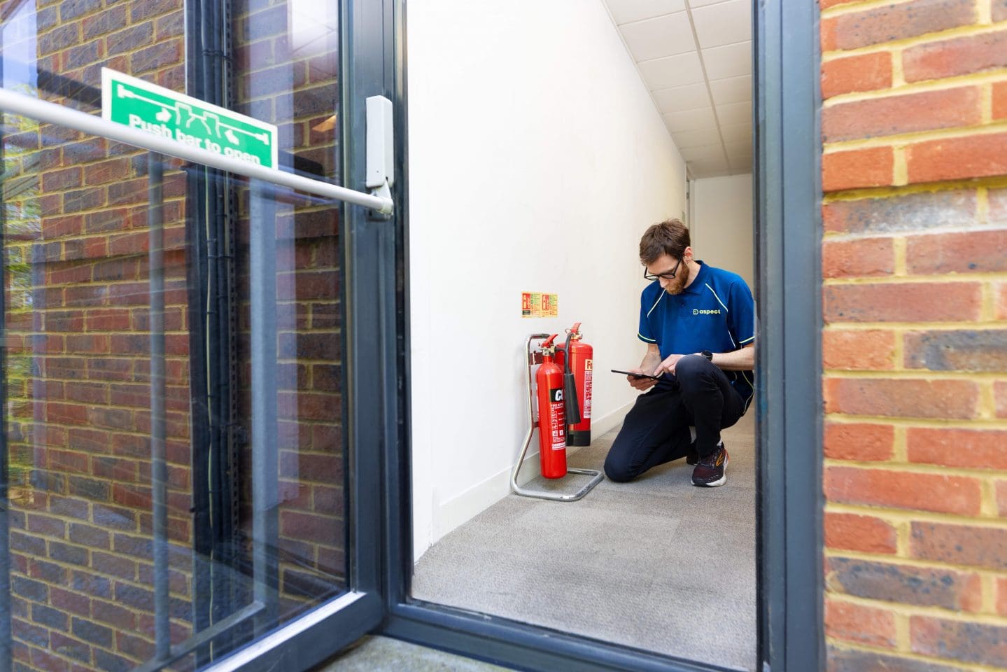 Aspect fire safety service. Fire safety consultant conducting a fire risk assessment