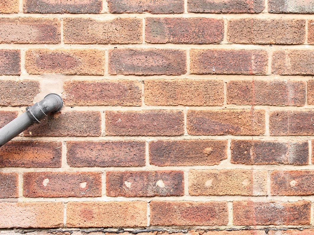 Holes in the wall for insulation of old houses
